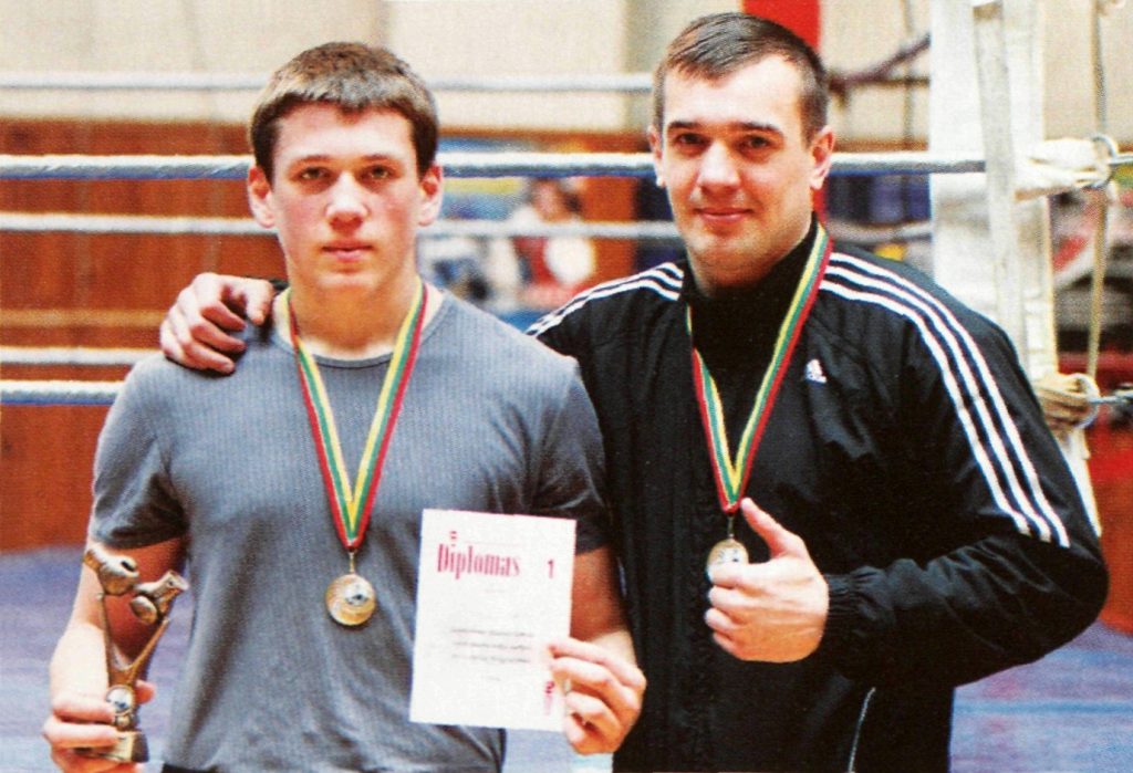 Europos ir pasaulio bokso čempionatų prizininkas O. Aukštkalnis ir jo treneris G. Vaištaras